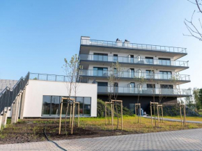 Nice apartment overlooking the river in Dziwnów